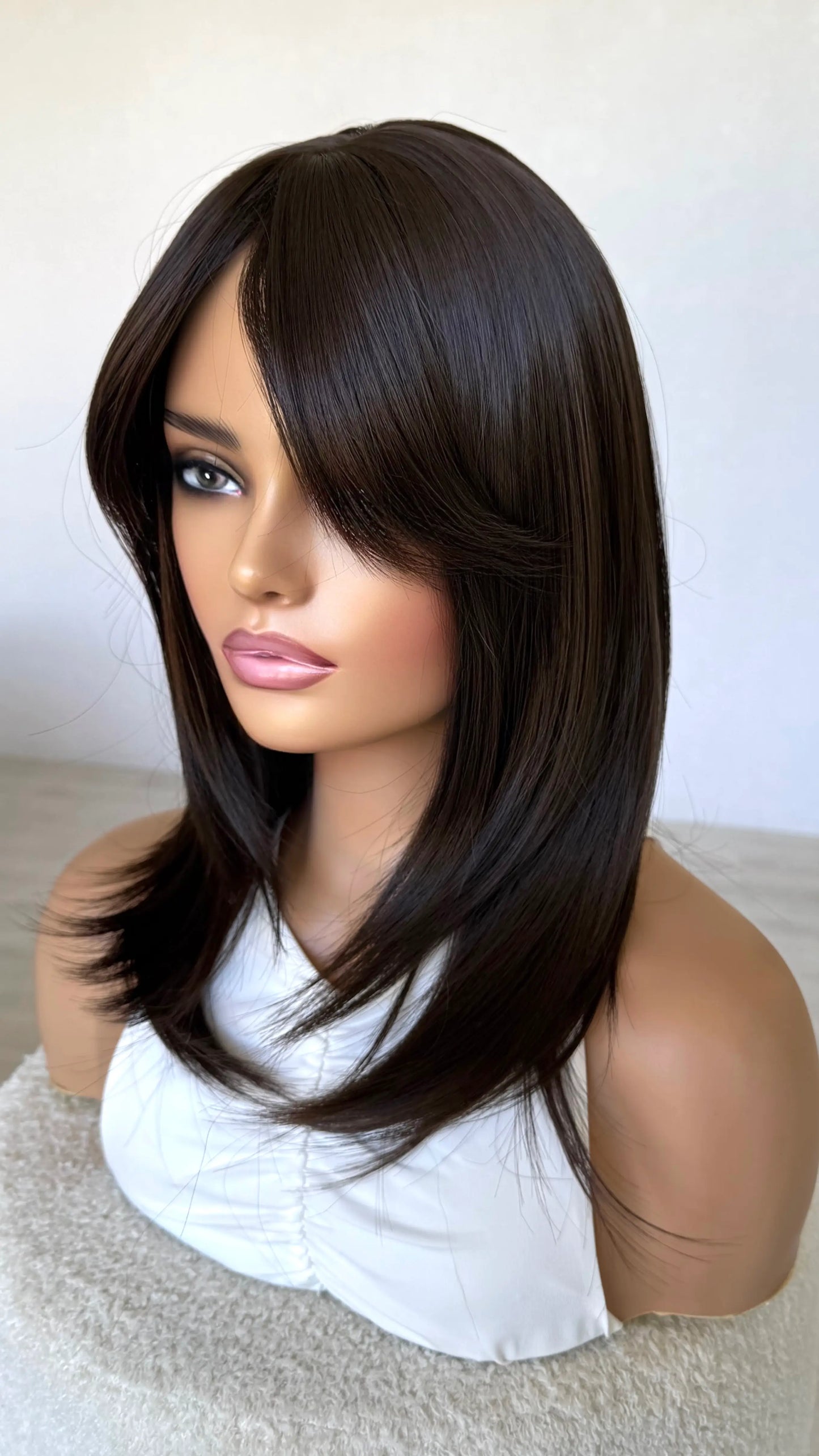 dark brown hair, middle part, curtain bang fringe parted to the side, long layered hair , heat safe and glueless synthetic wig australia.