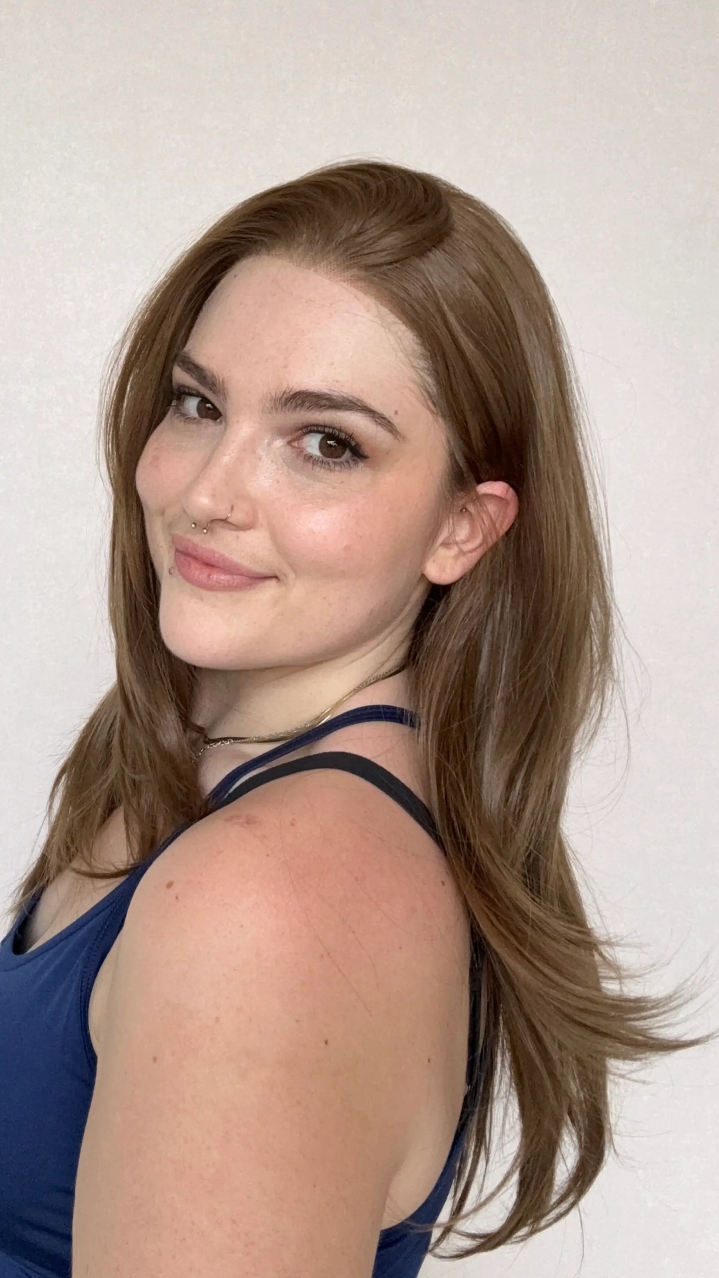 lace front warm brown hair wig, hair tucked back, heat safe wig glueless. 