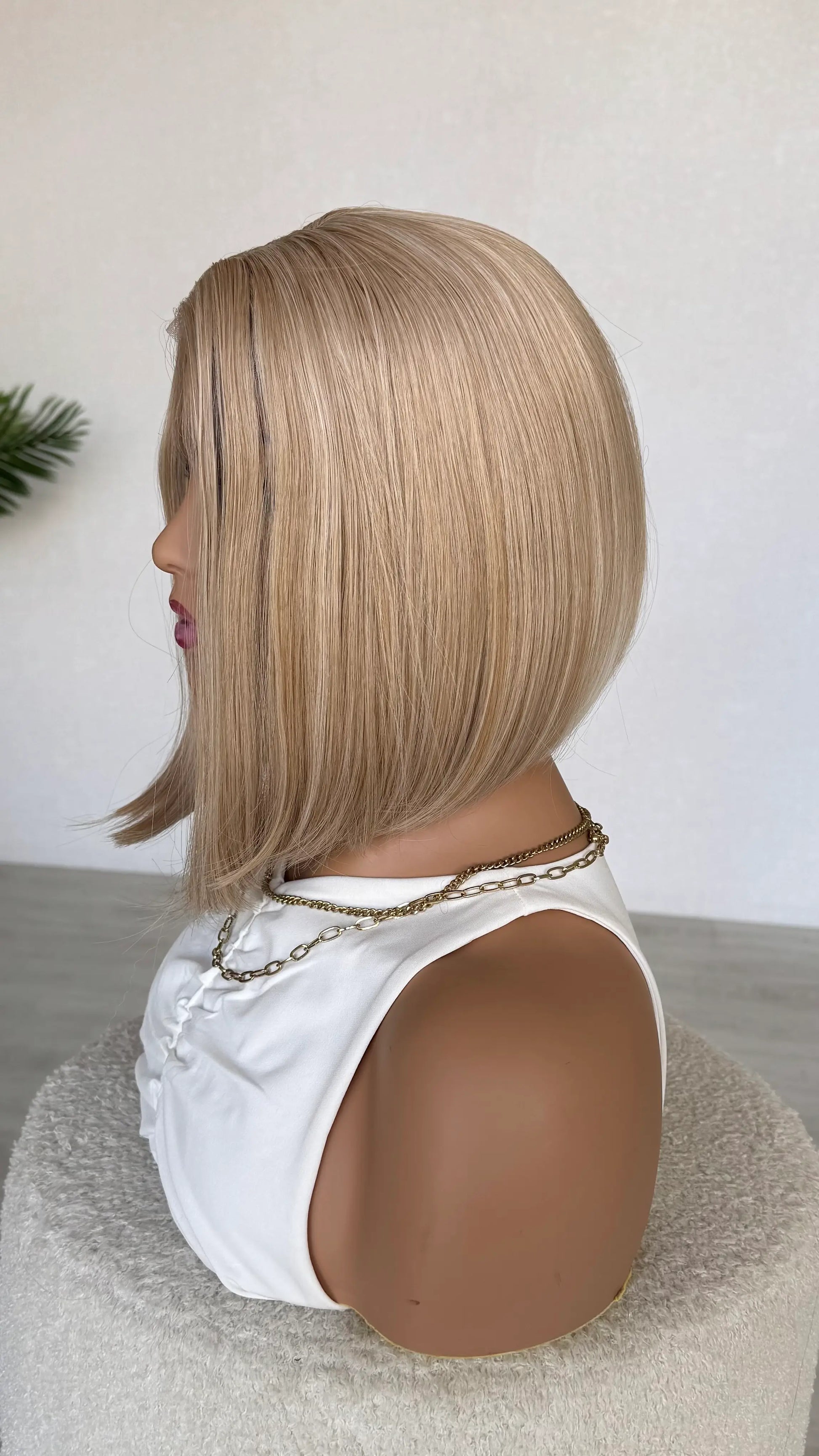 side view blonde concve bob, 12 inch lacefront no root, austrlia synthetic wigs. heat safe fibers.
