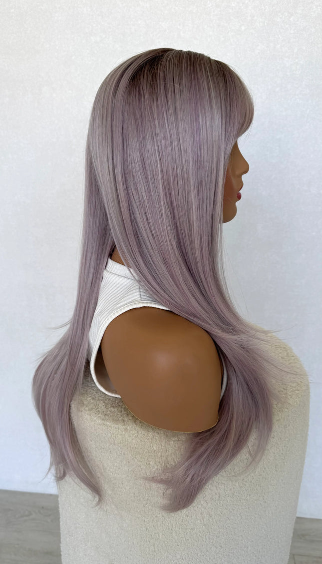 synthetic wig purple. side on view, long fringe topper