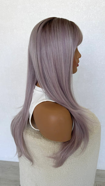 synthetic wig purple. side on view, long fringe topper