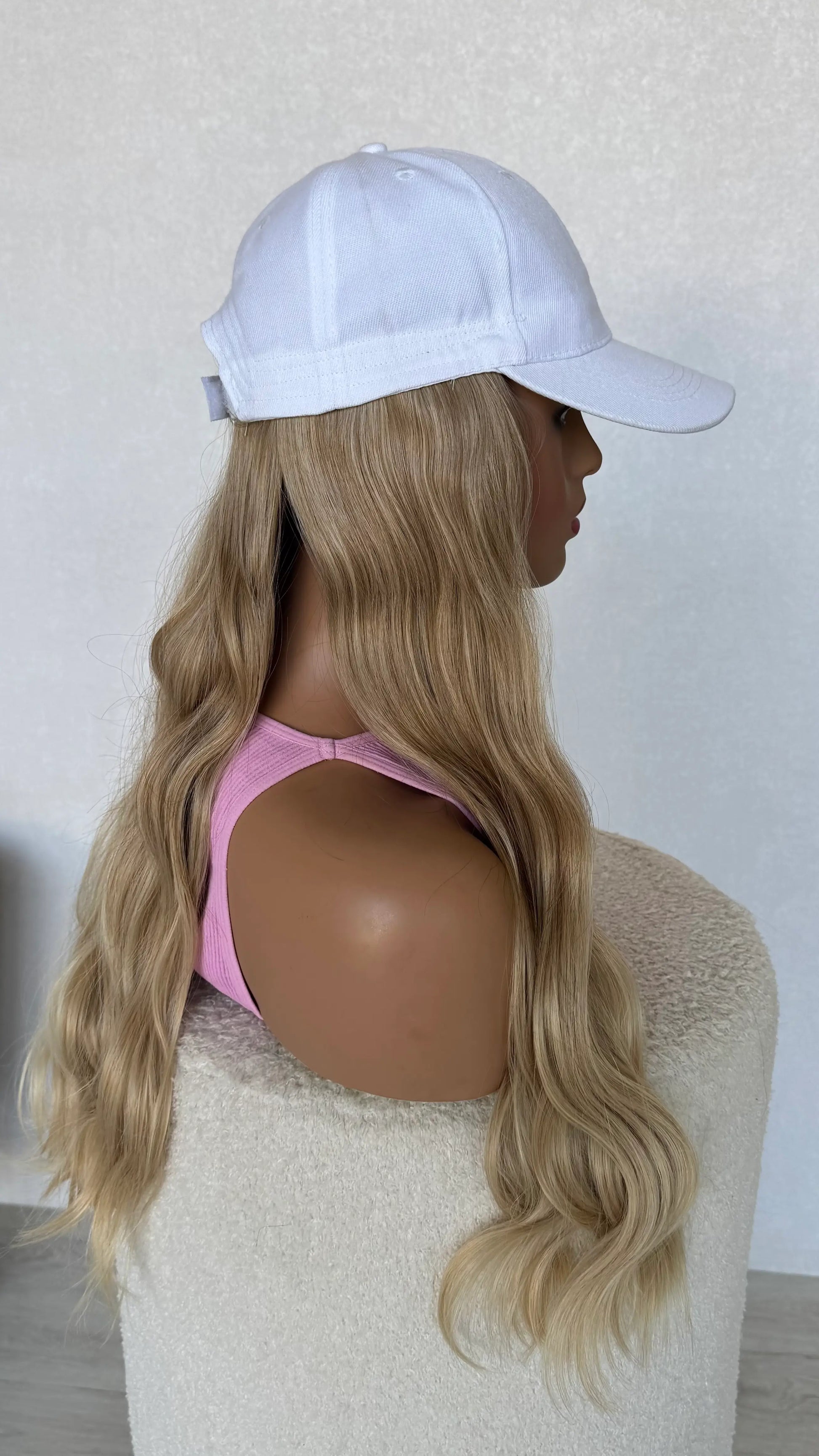 side view hat synthetic wig aura, soft blonde wavy hair