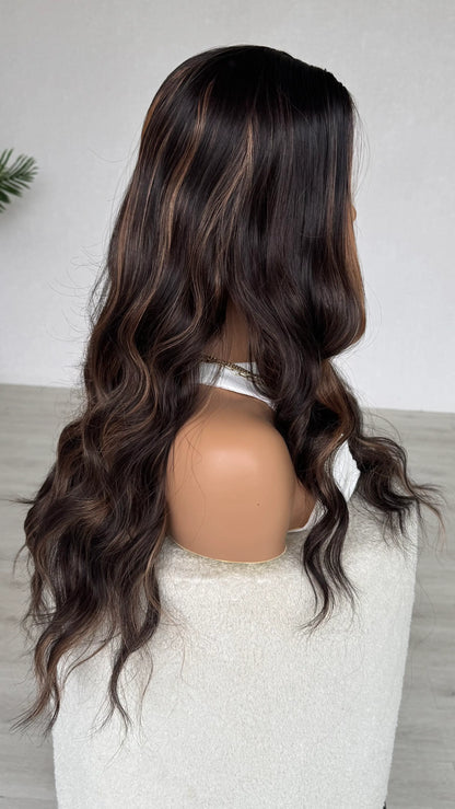 side view, long curly hair vixen. wavy brown hair, long length australia.