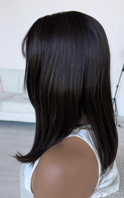 side view of 16-18 inch length hair, dark brunette fringe wig, heat safe synthetic fibres.