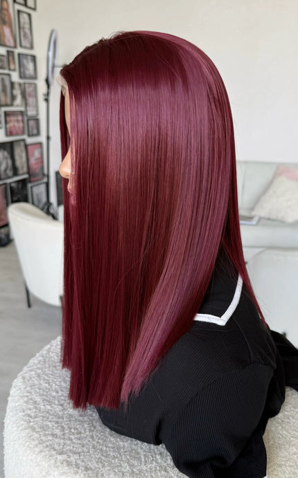 synthetic red wig with heat safe fibres for women with hairloss, alopecia.