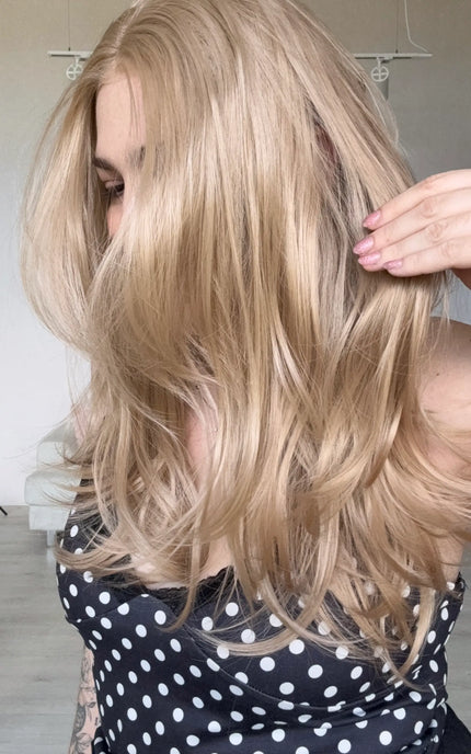 natural looking lace front wig from side view. soft rose beige blonde colour.