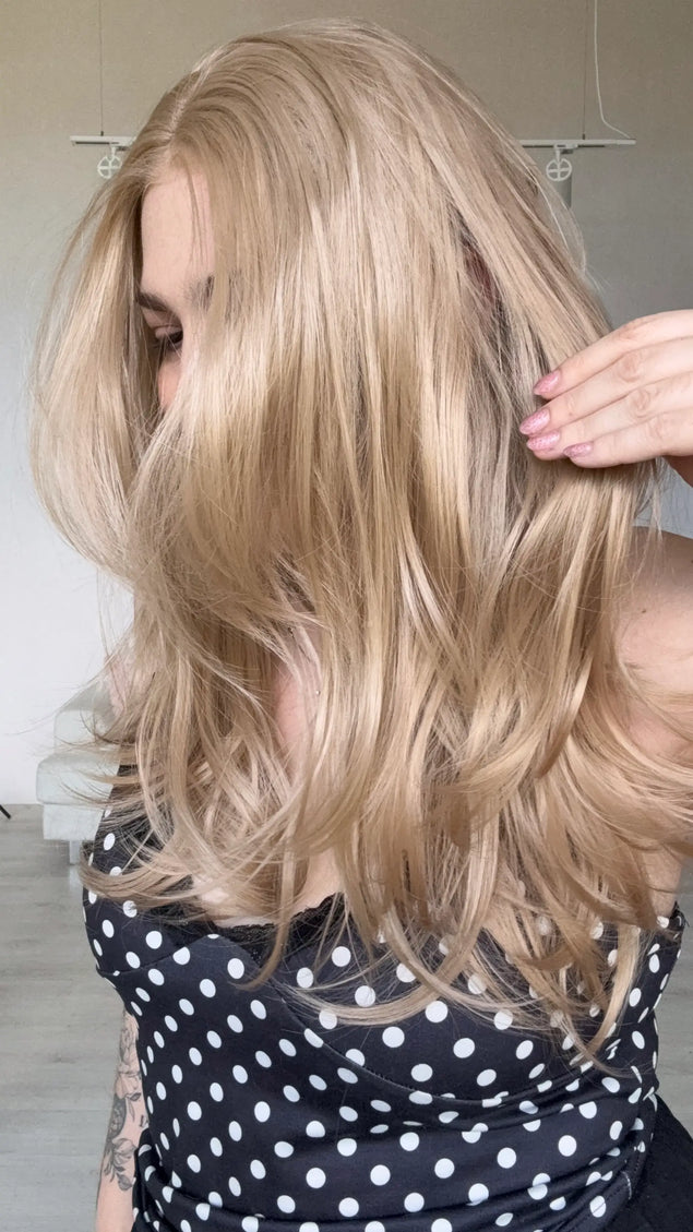 natural looking lace front wig from side view. soft rose beige blonde colour.