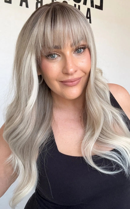 middle part silver ombre, fringe synthetic topper, heat safe and glueless.