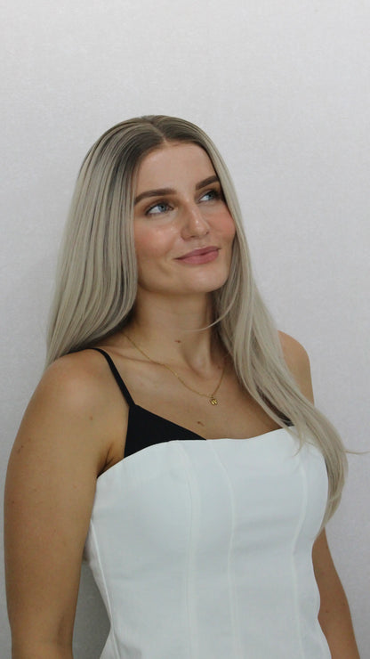 lacefront wig with middle part, darker root to pearl blonde hair, straight hair heat safe. 