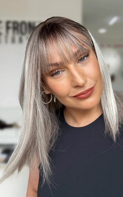 straight ash light grey hair long bob length with middle part and soft long fringe.