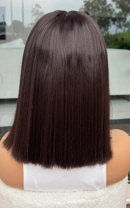 back view showcasing straight dark brown hair. lacefront synthetic - heat safe. 