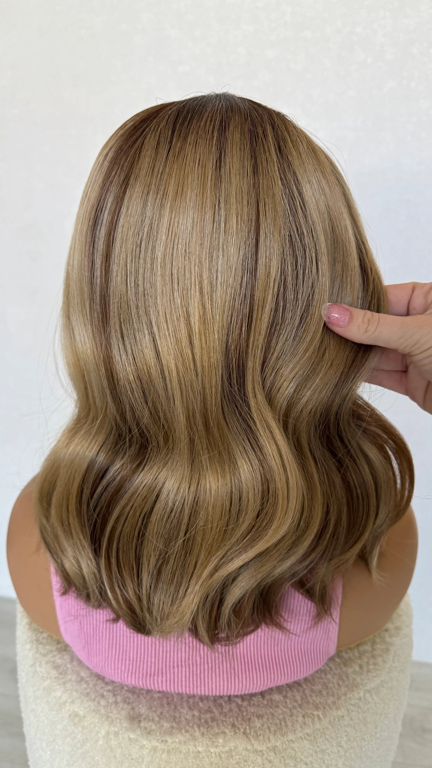 lacefront synthetic from back view, holding the 18 inch hair, glueless wig australia.