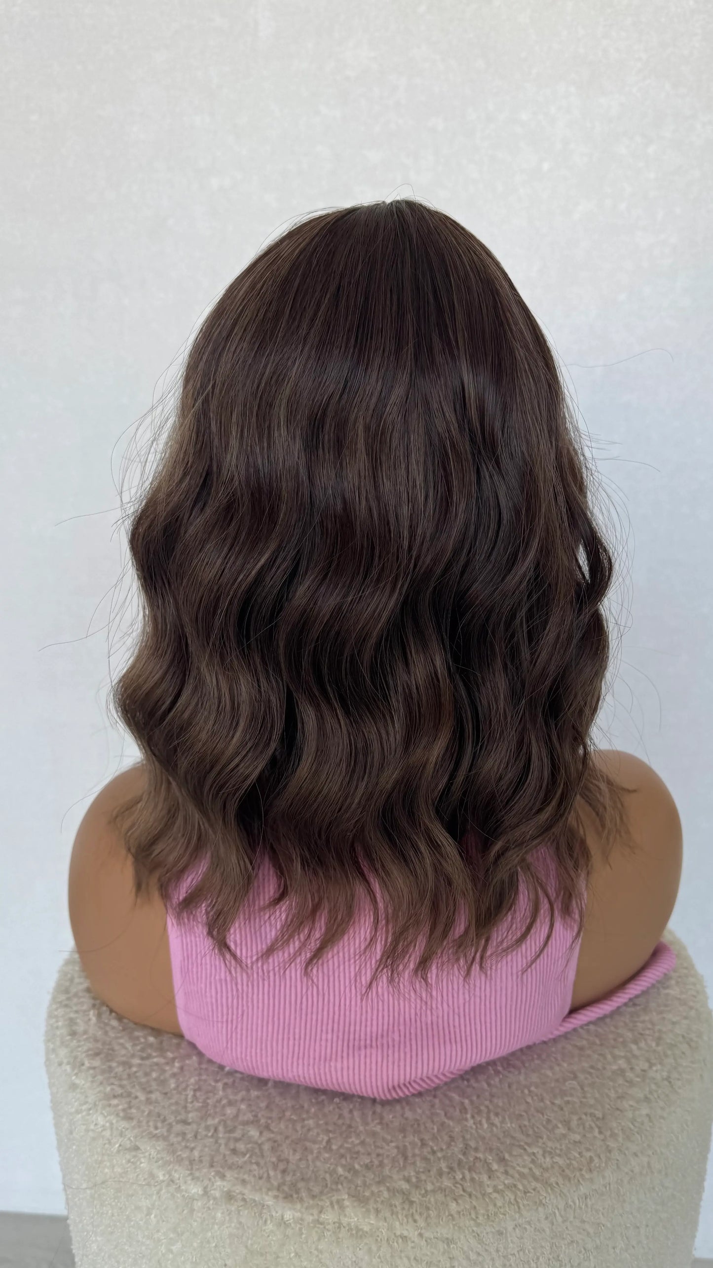 14 inch wavy neutral brunette fringe wig.
