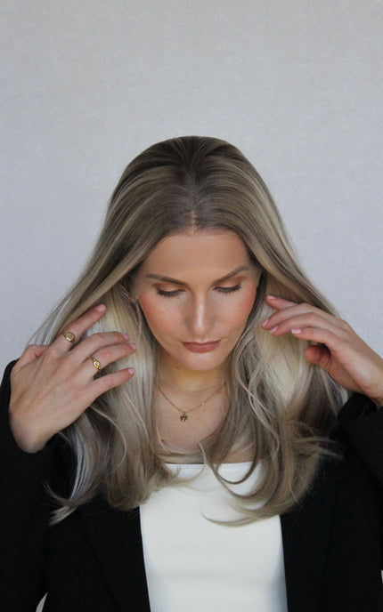 top view christina synthetic, glueless wig, lowlighted blonde with root.