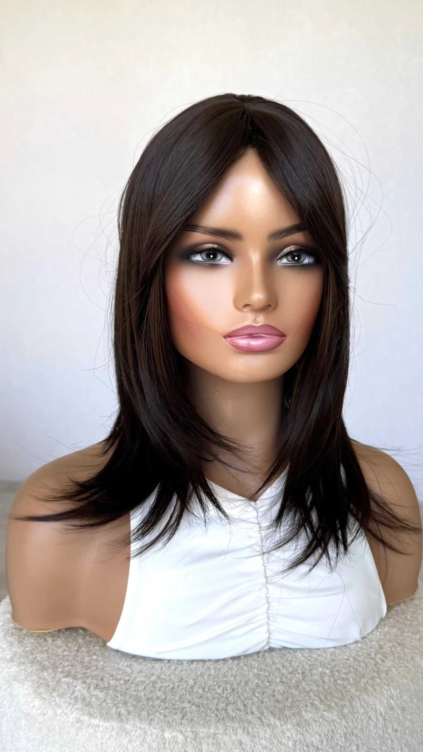 curtain bangs pulled to the side, middle part, layered hair wig, heat safe, glueless wig australia.