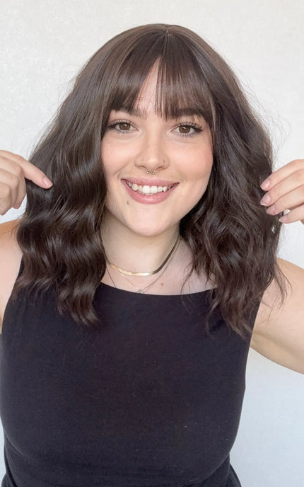 realistic wavy brunettte synthetic wig with fringe. for hairloss, alopecia, daily wear.
