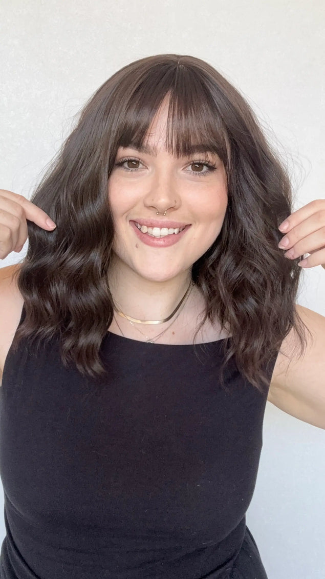 realistic wavy brunettte synthetic wig with fringe. for hairloss, alopecia, daily wear.
