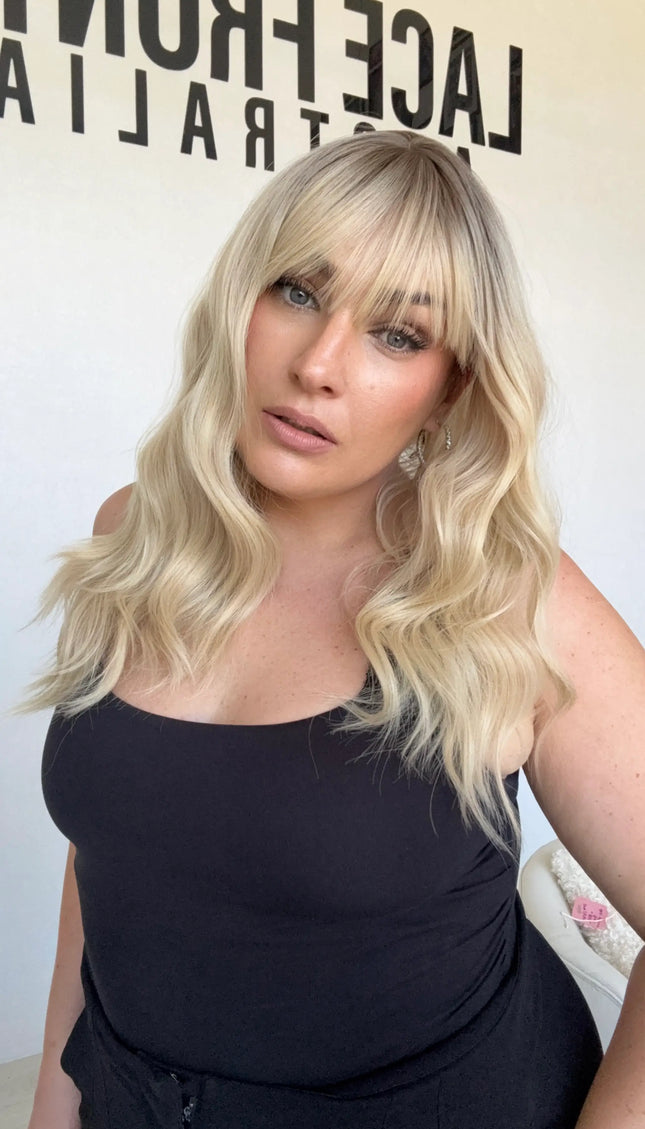 australia synthetic toppers, middle part with fringe , heat safe hair.