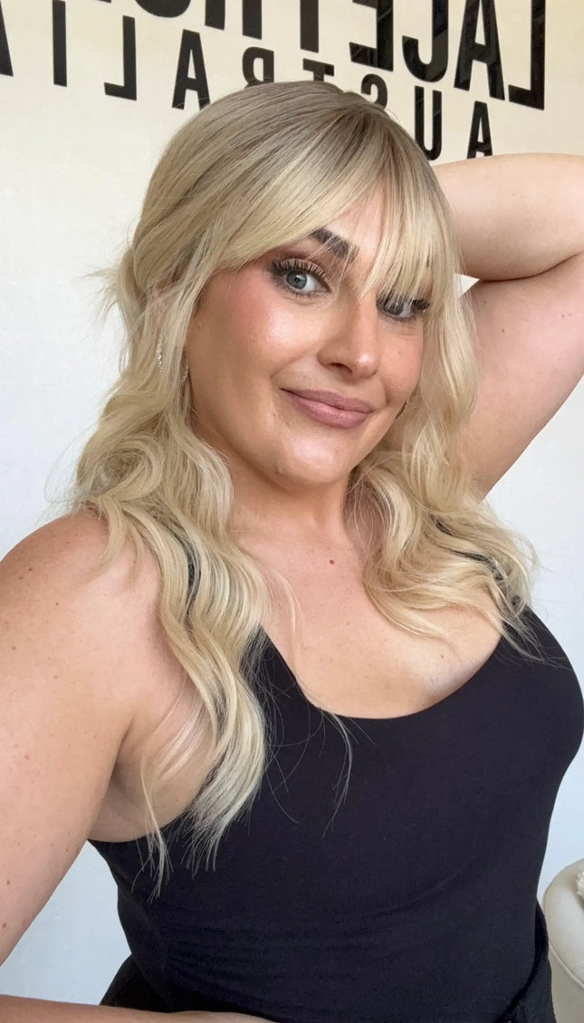 heat safe wavy blonde synthetic hair topper.
