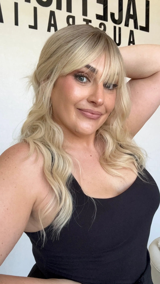 heat safe wavy blonde synthetic hair topper.
