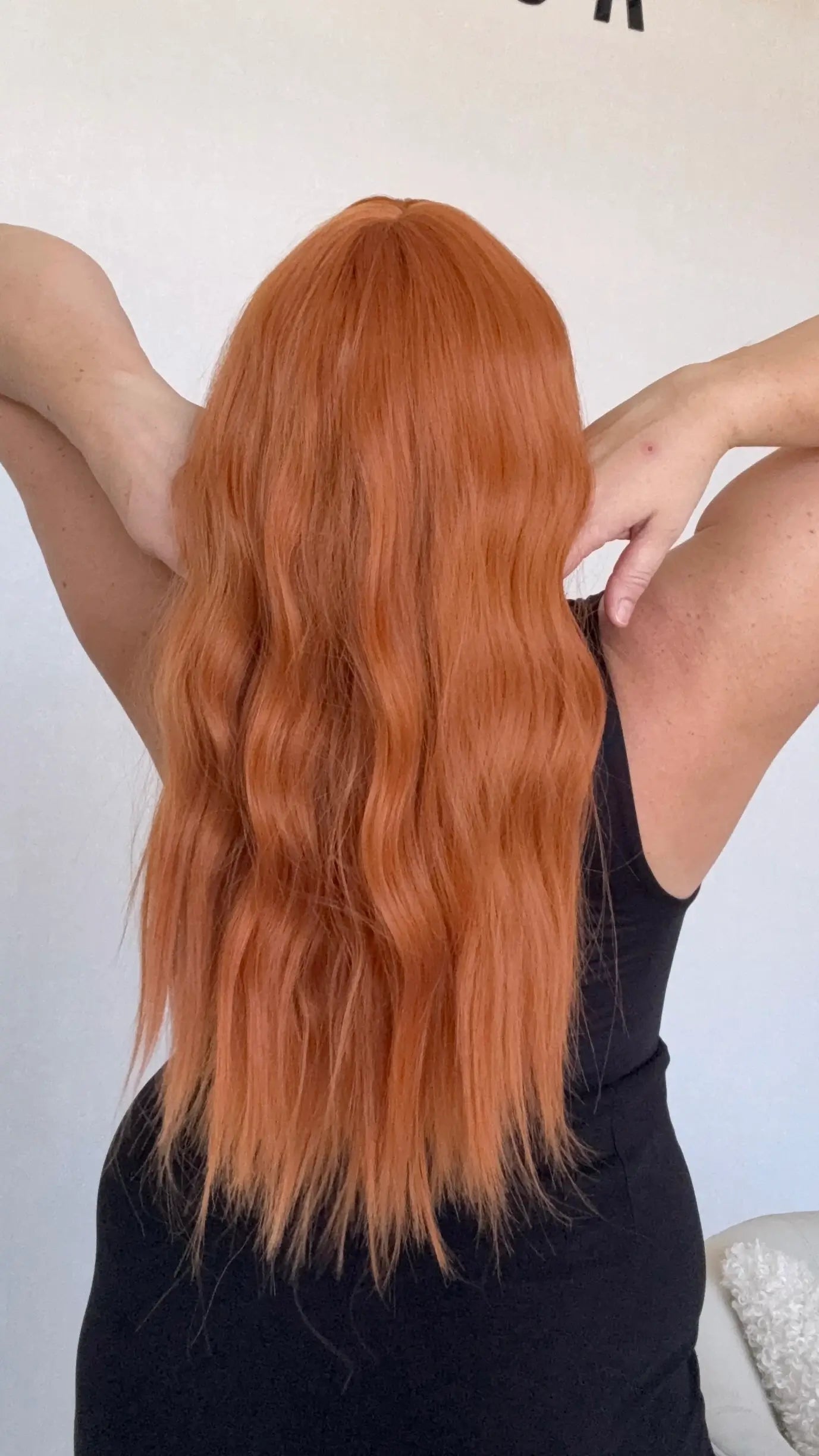 wavy bright ginger hair from back, heat safe synthetic wig australia.