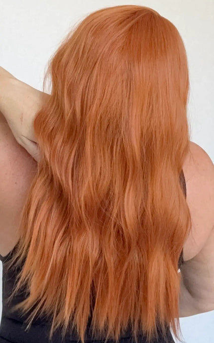 wavy hair bright copper heat safe synthetic wig australia, middle part with fringe.