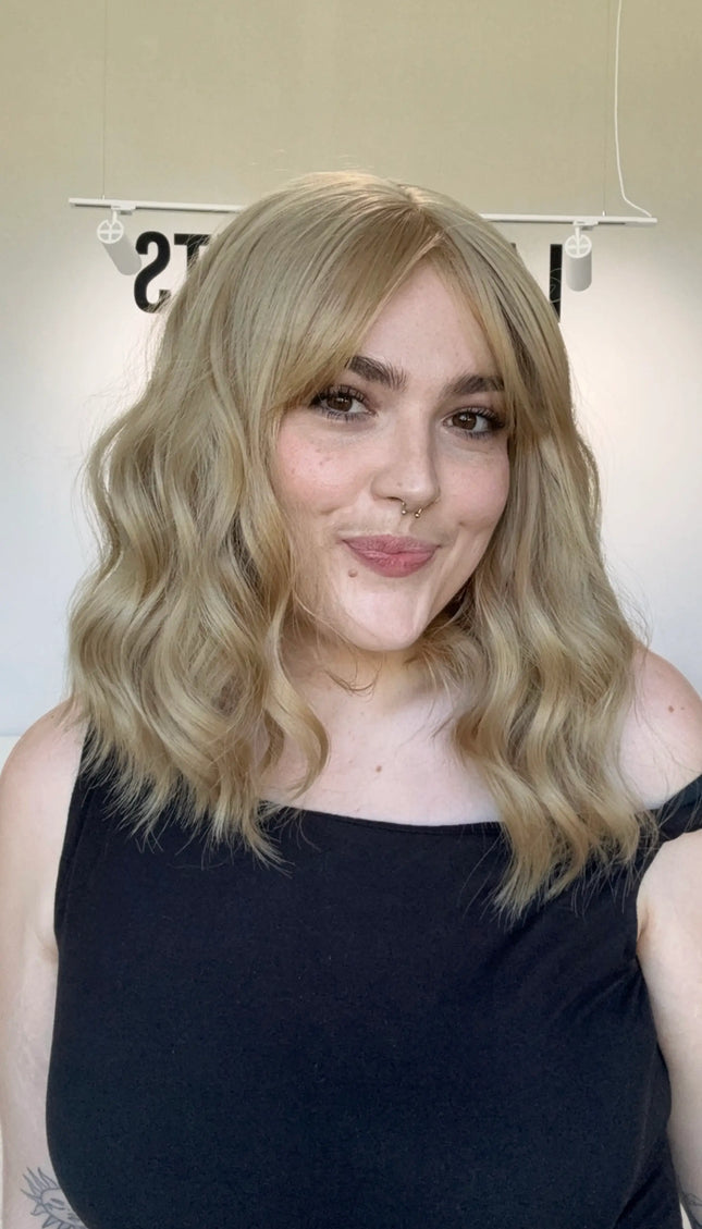 honey blonde wavy hair topper with middle part and fringe heat safe toppers australia.