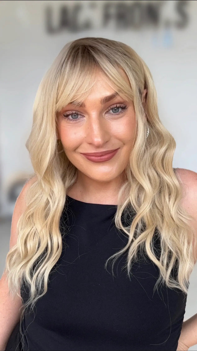 wavy warm blonde medium length hair natural looking wig, perfect for daily wear with a glueless cap and adjestable straps.