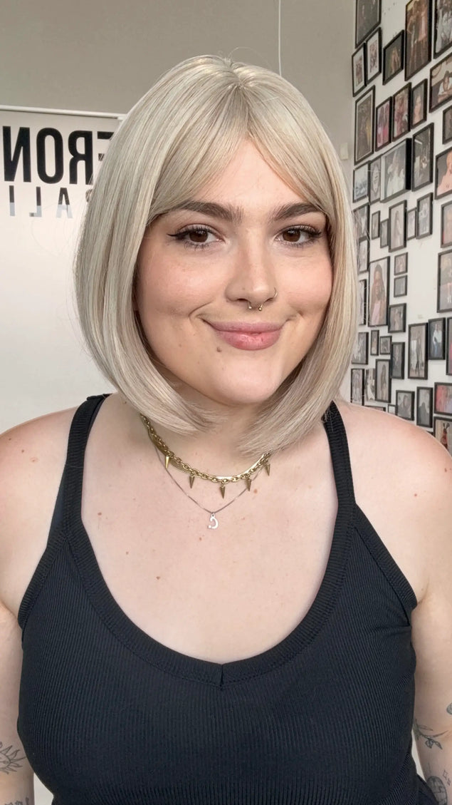 middle part white blonde fringe bob, heat safe hair, white blonde with fringe.
