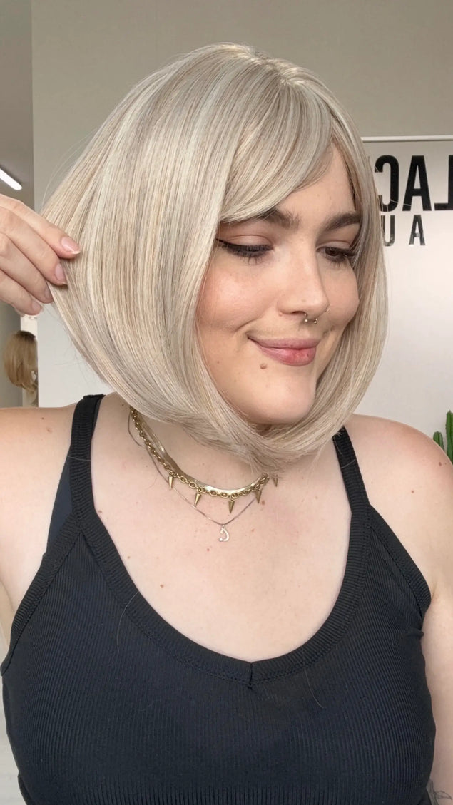 white blonde bob with fringe, heat safe synthetic, middle part, synthetic wig gold coast australia.